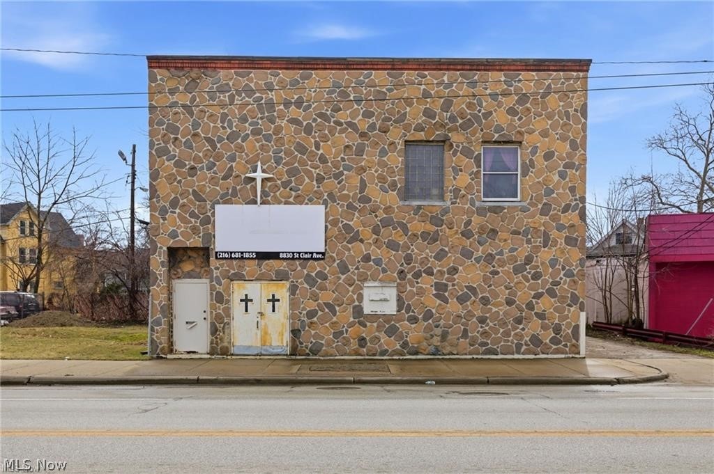 Attention Investors! Mixed-Use Opportunity with Strong Value-Add Potential! Positioned along the rapidly evolving St. Clair corridor, 8834 St. Clair Ave presents a rare opportunity to reposition a nearly 4,000-square-foot mixed-use property in Cleveland’s St. Clair–Superior neighborhood. Formerly used as a church, the property features a large open main-level space that offers flexibility for a variety of commercial, community, or redevelopment uses. Recent capital improvements include a newer roof and waterproofed basement, helping to reduce immediate renovation costs. A major value-add component is the second-floor residential unit with a separate entrance, offering 4 bedrooms and 1 full bathroom. Once renovated, this unit has the potential to generate approximately $1,800 per month in rental income, creating an additional revenue stream and enhancing overall return on investment. Investors will appreciate the opportunity to create multiple streams of income by combining commercial use on the main level with residential cash flow above. There is also the potential to purchase the adjacent lot, providing additional parking or future expansion opportunities. Conveniently located near the Cleveland Cultural Gardens with quick access to major highways, this property is situated in an area experiencing ongoing revitalization and investment. Whether you're a developer, investor, nonprofit, or entrepreneur, this is a compelling opportunity to unlock significant upside in one of Cleveland’s emerging corridors.