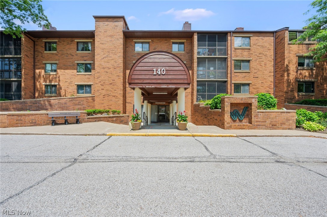 This Could Be the Place... Enjoy effortless living in this beautifully updated condominium in the highly desirable Woodhawk Club community. This spacious home offers 2 bedrooms, a versatile bonus room perfect for a home office, den, or guest space, and 2.5 bathrooms.

The stunning, newly remodeled kitchen features elegant quartz countertops, brand-new appliances, and a fresh, modern design that is both stylish and functional. The bathrooms have also been tastefully updated with new cabinetry and quartz countertops, creating a cohesive, sophisticated look throughout.

Abundant natural light fills the home, highlighting the freshly painted interior in a soft, neutral white palette. The convenience of in-unit laundry is enhanced with a brand-new washer and dryer.

Unwind on the private screened-in porch overlooking peaceful green space and mature trees, with direct access to the outdoors for an added connection to nature.

Additional highlights include two dedicated parking spaces, a private storage unit, and the convenience of two building entrances—one with easy stair access and another through the secure main lobby with elevator service.

Woodhawk Club offers exceptional resort-style amenities, including an impressive clubhouse, two swimming pools, tennis courts, a racquetball court, a fully equipped fitness center, and inviting common gathering spaces. Move right in and enjoy a low-maintenance lifestyle in one of the area's most sought-after communities.