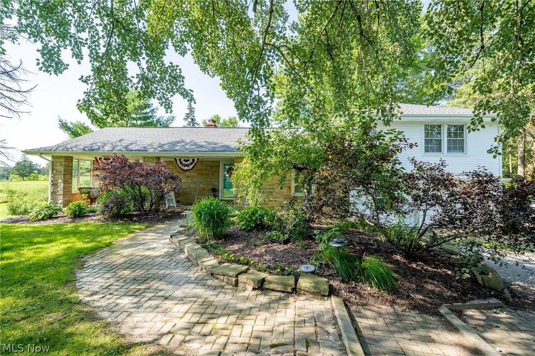 Come home to this beautifully well maintained four bedroom, two full bath home, on just over ten acres. Enjoy your property from the large covered front patio or spacious deck off the back of the home where the heated pool awaits you. The home has natural decor though-out. Eat-in kitchen has newer appliances, large pantry and access to the deck. This home has plenty of space for everyone! The two large outbuildings are perfect for your cars, boats, and livestock. Property has gas well, gas rights convey the property. Schedule your private showing before this one is SOLD.