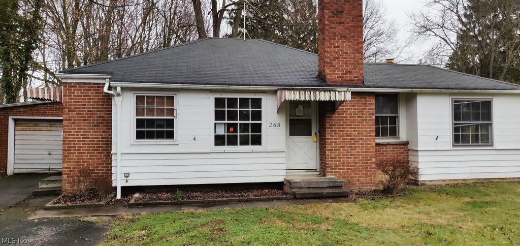 Quaint 3 bedroom ranch with plenty of potential, attached garage, full basement, wood floors and more!