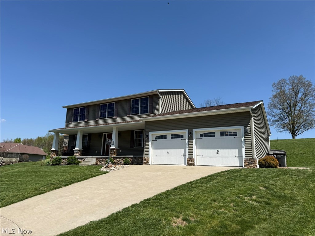 Spacious 4 bedroom, 2.5 bath stone and vinyl sided home. Open floor plan with wood laminate flooring. Island breakfast bar in the kitchen features Corian counters and walk in pantry. Glass doors in the dining room lead to the 14 X 10 covered rear patio with ceiling fan and additional two pavered patios with built in fire pit and lighted retaining wall. French door lead to the main floor office. Main floor laundry includes built in cabinetry and sink. Walk in closet in the master suite with full bath. Double sinks, 6' tile walk in shower and soaking tub in the master bath. Full, 13 course basement stubbed in for additional bathroom. Pella windows throughout. New gas hot water heater in 2025. 2 car attached garage. Tastefully landscaped lot. Private backyard in a country setting. Excellent location on a quiet cul-de-sac in Goshen Glens. Appliances not warranted. Exclude washer and dryer.