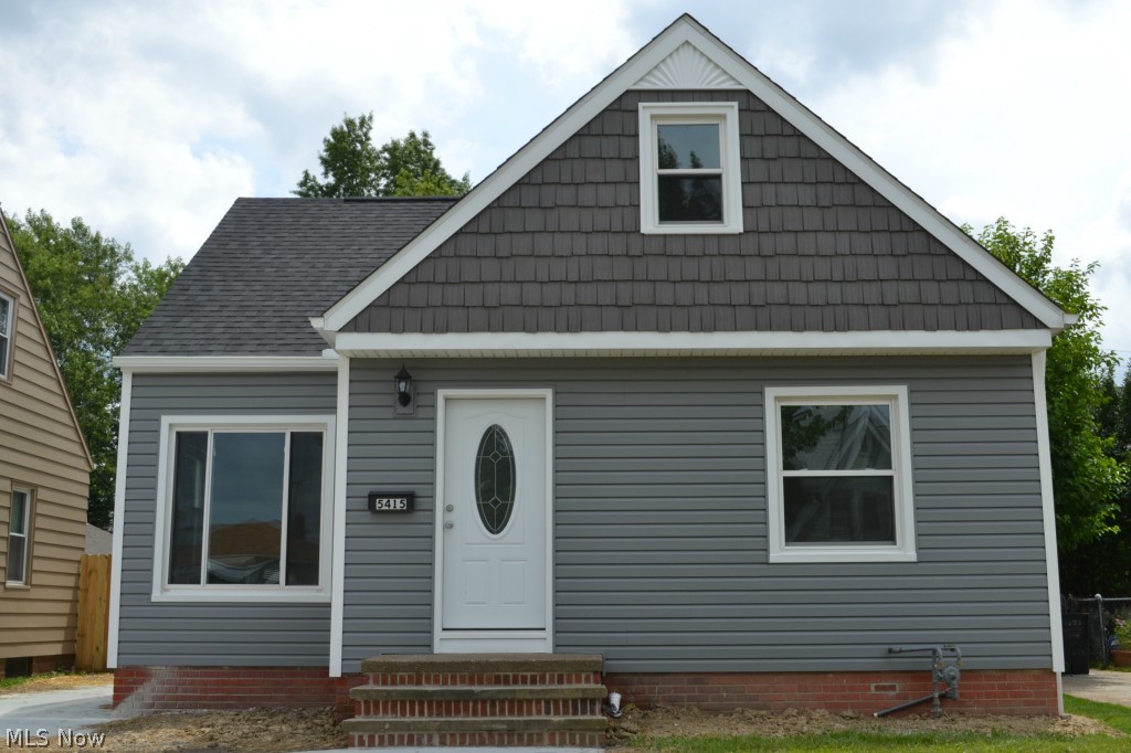 This Is The One You've Been Waiting For To Hit The Market! Completely Updated! Modern Design Throughout* Open & Airy Living Room* NEW Everything In Eat-In Kitchen ~ Granite Countertops, Cabinets, Hardwood Floor & All NEW Energy Efficient Appliances That Stay! Main Bath Completely Redone With Vanity, Ceramic Floor And Tub Surround! Large Master Upstairs With Sitting Area/Study & Plenty Of Storage Space* New Carpet* New Vinyl Windows, Doors, Electric, Furnace & A/C! New Roof,Gutters,Downspouts and Vinyl Siding* All New Lower Level Has Rec Room With Full Bath & Plenty Of Room For Entertaining! 1.5 Car Garage * All New Concrete Driveway and Walks* Relaxing Front Porch! Its All Been Done For You & What A Great Place To Call Home!!