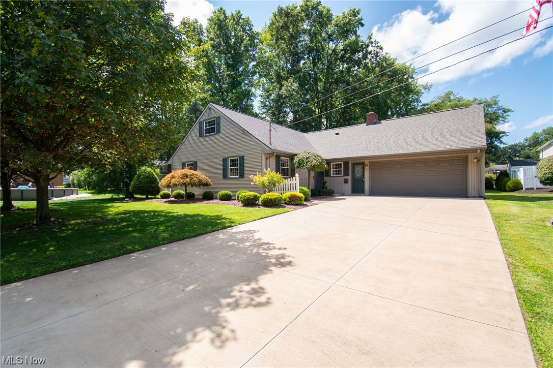 Take a walk through this impeccably maintained 4 bedroom, 3 full bathroom bungalow in Columbiana schools and fall in love. Located on a quiet street, just steps away from Firestone park. this spacious home is everything you have been searching for. On the main level you will find a beautiful kitchen with newer stainless appliances, multiple living spaces, two bedrooms, 2 full bathrooms and as an added bonus, a fully enclosed 4 seasons room perfect for year round indoor/outdoor living. Upstairs you will find two additional bedrooms, another full bath and 3 flex rooms that could be utilized for a multitude of creative uses. Currently they are being showcased as individual libraries for the children.   With 14 closets throughout the home, a full basement and an abundance of kitchen cabinets, you will never lack for storage space. Whether you are just starting out, looking for some space to grow, busting at the seems in your current home, or looking for single floor living as you downsize, this could be the perfect next home for you. Recent updates include: roof (23), fridge (23), HWT (21) and newer windows. Call your favorite agent today to schedule a private tour. ***Brand new electric panel & dishwasher  (24)***