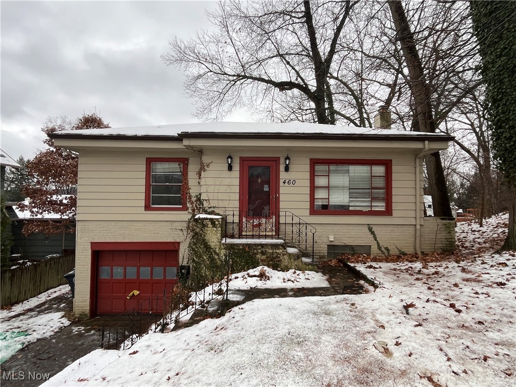 LOCATION, LOCATION, LOCATION! This raised ranch in the sought-after Merriman Valley is ready for a remodel. Just minutes from Stan Hywet, shopping in the valley, Route 8, and Akron, you can’t beat this spot. Cobblestone, tree-lined streets lead to a home bursting with potential—a perfect holiday gift for its new owner! All 1,221 square feet need updates, but it’s priced to sell. Wood floors run through the main living area, two bedrooms, and hallways- ready to be refinished to their former shine. The kitchen opens to an elevated deck overlooking a private tree lined backyard. The full basement connects to the attached garage and could be finished into a spacious bonus room, with a second oversized laundry and storage area. One-car heated garage included. Whether you’re an investor looking to rehab or rent, or a buyer eager to make it your own, this home won’t last—schedule your showing today!