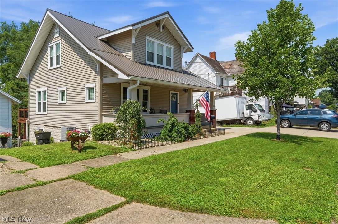 Welcome Home to this beautifully maintained property in a well-established neighborhood!  Offering nearly 2,000 square feet of comfortable living space, this inviting home features three bedrooms and two full bathrooms designed for everyday living.  Pride of ownership is evident throughout, with valuable updates including a newer HVAC system and a durable metal roof.  The walk out lower level, complete with double doors leading outside, offers two rooms that can be used as a family room, home office or recreation area.  A spacious two-car detached garage with paved driveway provides plenty of room for vehicle storage and off street parking. Combining thoughtful updates, abundant storage and a desirable location, this move-in-ready home is one you won't want to miss!