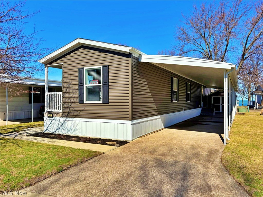 Experience the ease of Lake Erie living in this beautiful 2022-built mobile home located in the desirable Shore Acres, right next to Sherod Park. This nearly 1,200 sq. ft. home offers 2 bedrooms and 2 full bathrooms with a gorgeous, modern interior throughout. The home is being sold fully furnished and includes all appliances, making it completely move-in ready. The primary bedroom offers a view of Lake Erie, and a small back deck provides the perfect place to relax and enjoy the lake breeze. An attached shed with electricity, built-in shelving, and a skylight provides great storage or workspace with natural light. Residents of Shore Acres enjoy access to a private beach and three piers reserved exclusively for park residents. Everything inside the home is in like-new condition. Just bring your suitcase—everything else is already here.