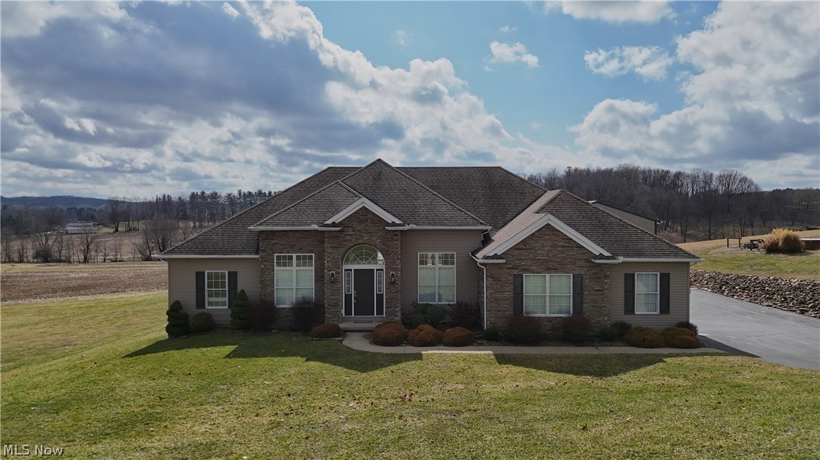 This home offers a rare opportunity to join one of St. Clair Township’s most exclusive neighborhoods, where properties are seldom available. Situated on a sprawling one-acre lot within the Beaver Local School District, this 4-bedroom, 2.5-bathroom residence combines space, privacy, and exceptional utility. The interior features a thoughtful layout, highlighted by a spacious primary suite designed for relaxation. It includes a generous walk-in closet and a large soaking tub. Three additional bedrooms provide plenty of space for family or guests. For those looking to expand their living area, the massive basement offers a clean slate with the potential to be finished into a home theater, gym, or recreation room. Outdoor living is a priority here, with a covered patio perfect for entertaining or enjoying the quiet surroundings of the acre lot. A standout feature of this property is the massive 30x48 outbuilding. Ideal for hobbyists, collectors, or professionals, it comes equipped with a car lift and offers significant storage and workspace. This property provides the perfect balance of a high-end residential feel with the functional space today's buyers are looking for. Property Highlights: Location: St. Clair Township, Beaver Local Schools Bedrooms/Baths: 4 Bed, 2.5 Bath Primary Suite: Walk-in closet and large soaking tub Lot Size: 1 Acre Outbuilding: 30x48 with car lift Additional Features: Large basement with finishing potential and a covered patio