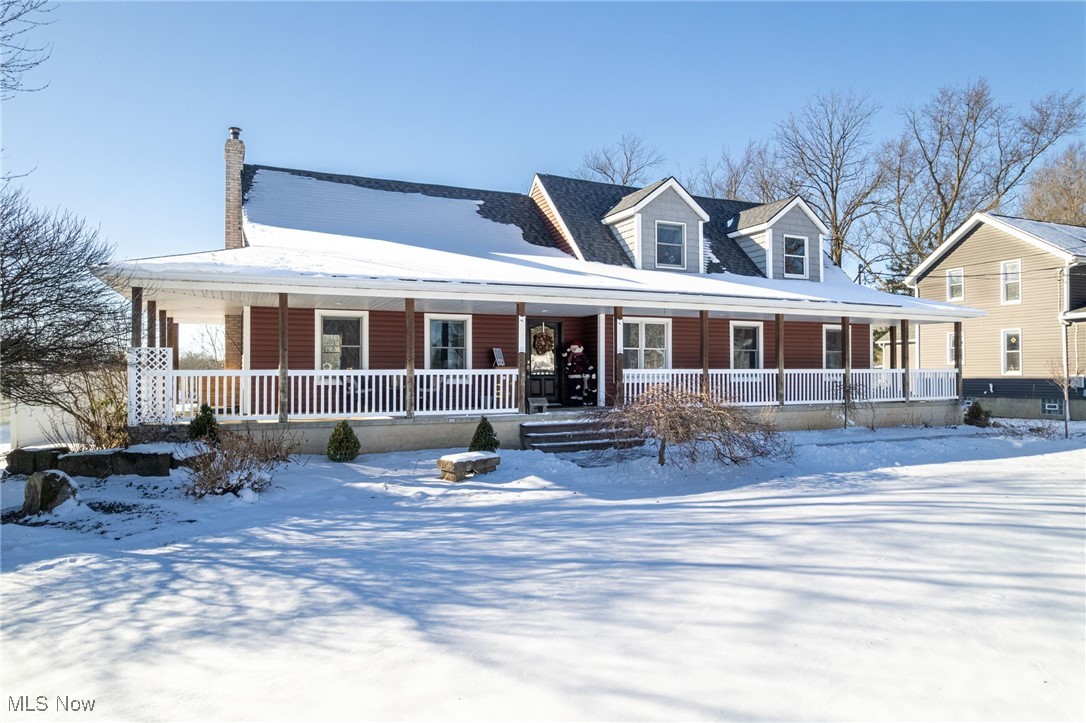 The Ultimate Hobbyist’s Haven: A Chef’s Kitchen Inside, a 2,400 Sq Ft Heated 4 Car garage/Workshop plus an attached insulated lean to addition. Discover the perfect harmony of historic Craftsman soul and modern luxury. This meticulously maintained 3-bedroom, 3.5-bath residence offers approximately 2,657 sq ft of high-end living space. The heart of the home is a chef’s kitchen featuring a professional Thermador range, SS appliances, crisper drawer, Kohler pot-filler, and custom two-tone cabinetry anchored by a massive island with granite countertops. The main level flows into a light-filled living room with cathedral ceilings and a cozy wood-burning stove with an open staircase to the family room in the lower level. Designed for maximum flexibility, the first floor includes a spacious owner's bedroom, walk-in closet and a bath w/soaking freestanding tub and a huge corner tile shower, perfect for single-level living. A unique, room-sized "Mega-Pantry" serves as the command center, doubling as a laundry room, craft space, and private office. The exterior infrastructure is a rare treasure. The 2,400 sq. ft. accessory building features heated floors, electric, and water—ideal for car enthusiasts, woodworkers, or home businesses, this is complemented by  a large storage add-on. The oversized 2-car garage also has a covered patio. Key Updates & Features: Mechanicals: Hot water tank (2025), AC condenser (2023), well pump/tank (2019), and new septic (2012). Exterior: New roof and siding (2020); kitchen/pantry windows (2020). Lifestyle: Classic wrap-around porch on a level .89-acre lot with a koi pond and waterfall. This home has excellent freeway access. Call your favorite realtor to see this home today!