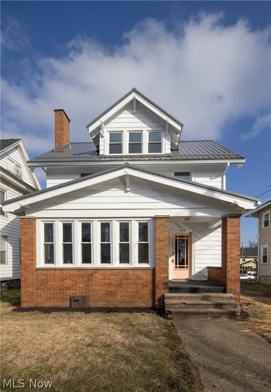 Incredible opportunity to own this beautifully renovated 3 story colonial in Massillon. EVERYTHING IS NEW. New, windows, new metal roof, new furnace, all new flooring, all new kitchen with SS appliances. There is so much living space including a morning room/office, a 1st floor laundry and 1/2 bath. A 3rd floor finished attic space for additional bedroom, man cave, or kids play area. This home is full of character including original doors and a 2 sided stair case leading to upstairs bedrooms and bath. Choose to enter the 2nd floor from either the front entrance or the kitchen. This home is beautiful and professionally renovated and updated. Nothing to do, except move in.