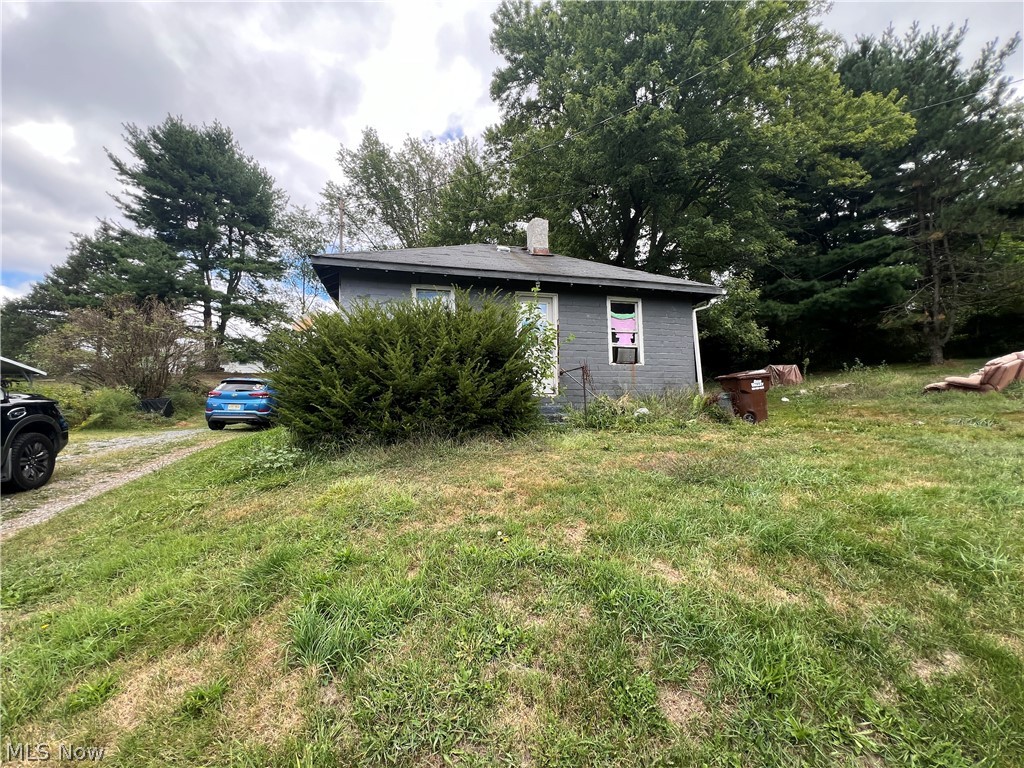 Prime investment opportunity! This solid block home on a basement is ready for its next chapter. Situated in a highly visible, desirable location, the property offers excellent potential for renovation along with the possibility of billboard income. The home will require significant repairs and is being sold as-is. Due to its condition, it will most likely not qualify for conventional financing, making it an ideal project for an investor, contractor, or handyman looking to add value. Bring your vision and unlock the potential this unique property has to offer!
