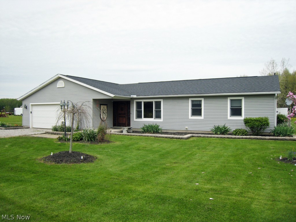 Take a look at this beautiful Ranch built in 1992.  From the moment you reach the front door you'll be in love with your new home! Quality custom front door is the first sign that this home is a step above & the rest of the home matches the quality & prestige.  Once inside the front door you're welcomed by the spacious open intelligent floor plan which showcases the beautifully remodeled kitchen, dining room, & foyer.  The great room is to the left & behind the garage. The great room is huge with a large corner fireplace, space for extra large furniture & tv area.  The great room leads out onto the patio which is also accessible directly from the kitchen.  The property is large with a portion of the yard fenced off around the back of the home. Currently there is a vinyl privacy fence running down both sides of the yard with a picket fence at the back of the fenced portion. (Yard extends past the picket fence.)  This home is a must see and you'll be WOWED! Schedule your showing today!