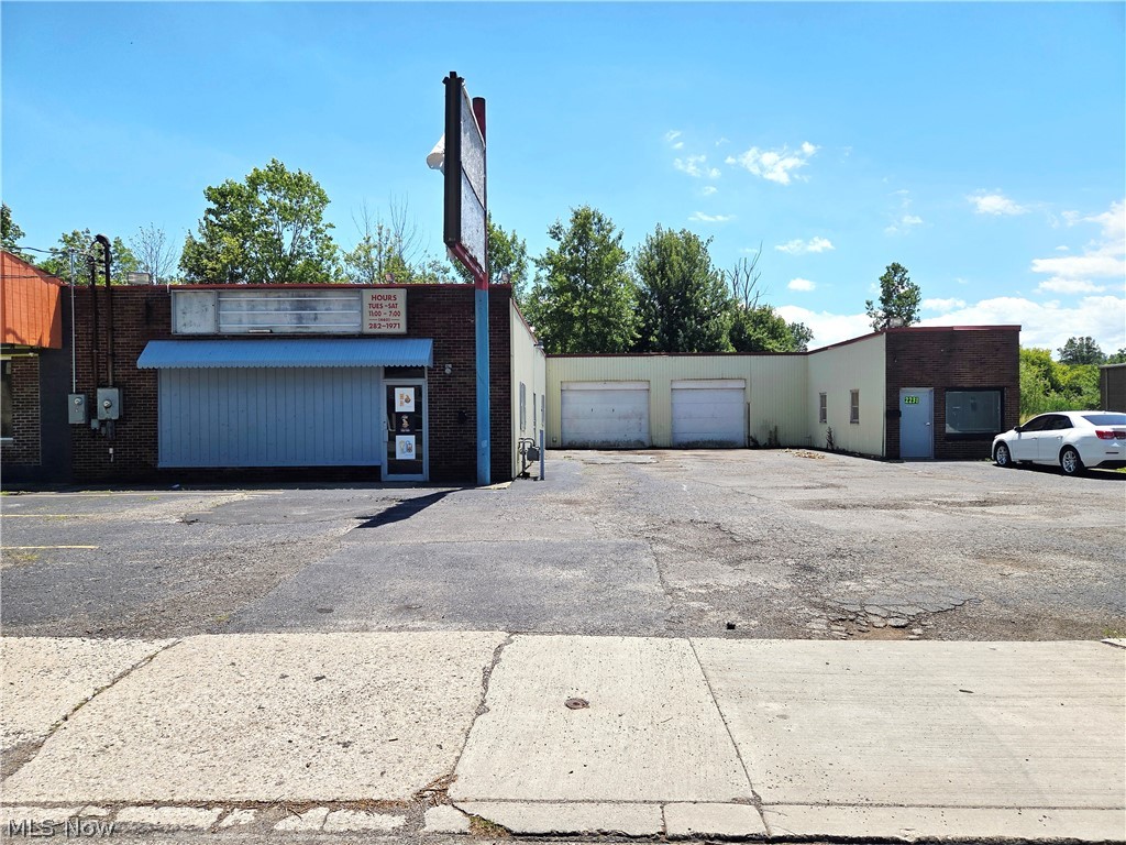 Great commercial opportunity in a high-traffic location in Lorain. This unique property consists of five parcels with convenient access from W. 21st Street and possible access from Leavitt Road for multiple points of entry and exit. The building's unique drive-through configuration, featuring garage doors on both sides, makes it well-suited for a beverage drive-thru, coffee concept, quick-service restaurant, automotive use, or other retail operations. Multiple parcels, strong visibility, existing income, and commercial zoning combine to create an attractive opportunity for investors, and business owners alike. A portion of the property is currently occupied by a restaurant tenant at $1,200 per month. The restaurant includes a small dining area and some existing kitchen equipment, offering immediate income potential and flexibility for future use. An additional space within the building is well-suited for office use and includes a full bathroom with shower, creating opportunities for professional services, or additional rental income. With strong traffic counts, excellent accessibility, multiple parcels, and a flexible layout, this property offers tremendous potential for investors, entrepreneurs, and business owners. Take advantage of this opportunity today!!