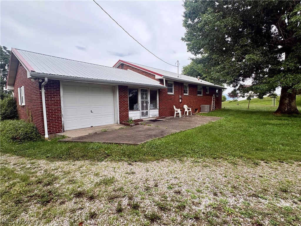 Check out this home!  It has been loved for years and is ready for its new owners. Bring your imagination to this solid ranch home with over 2300 finished sq ft and endless possibilities.  This 5 bedroom and 2 bath home has plenty of room for everyone and is a great blend of location, space and opportunity to grow. The upstairs has 3 beds, beautiful hardwood floors and built-ins.  Take a trip to the full basement to find another 2 bedrooms, a full bath and a large family room along with plenty of unfinished space for storage. As you head outside you pass through the enclosed breezeway to an attached garage.  Head out back to find a 24x18 detached garage sitting on 1.26 acres, the perfect location for a mini farm, open space or building space.