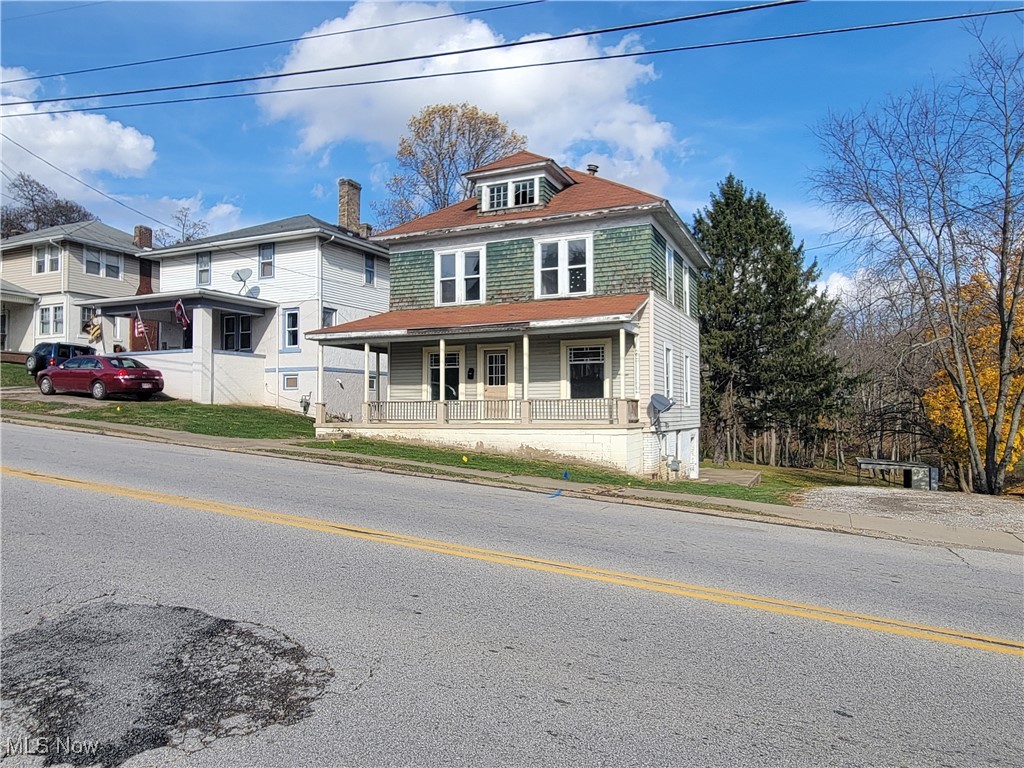Older home with lots of character, ready for you to bring your ideas and remodel to suit your needs. Will make a great single family home for large family or could be duplexed/ or rented for the income. Lots of bedrooms, nice rear deck, large yard, great for a family. Vinyl siding and furnace approx 15 yrs old per seller. 100 Amp electric service, rewired per seller. Several newer windows throughout. Take a look to day and you decide.
Located just 2 blocks from Harrison Hills High School and 1 block from the football field.