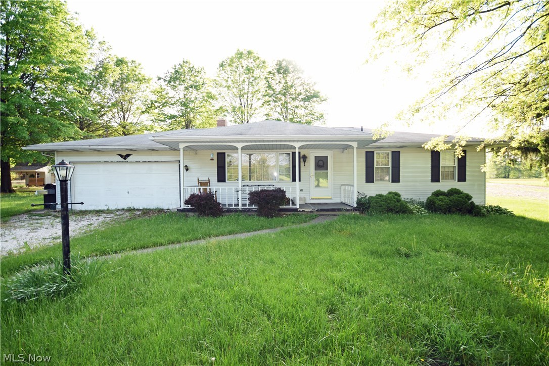 Cozy Ranch style home featuring 2 bedrooms and 2 full baths.  The spacious eat-in kitchen has a wood burning stove and sliding glass doors that lead to your 3-season room.  First floor laundry allows for complete one level living.   Need more space?  The large open basement has tons of potential.  Situated on a beautiful 1.75 acre county lot with 2 car detached garage.  Tons of potential! Comes with America's Preferred Home Warranty! Call Today!