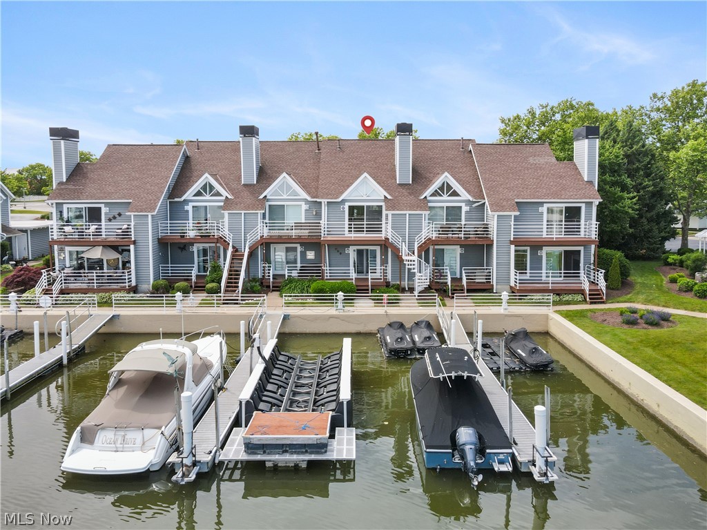Live where every day feels like a vacation.

Welcome to waterfront living at its finest. Perfectly positioned in the heart of the community, this beautifully updated 2-bedroom plus additional loft, 2.5-bath condo offers the lifestyle boaters dream about and vacation-home buyers search for. Fresh paint, updated flooring, and a renovated kitchen create a bright, move-in-ready interior, while soaring ceilings and expansive water views make every room feel open and inviting.

The true showstopper? Your private dock is just steps from your door. Imagine waking up, grabbing your coffee, walking down from one of 3 of  your private decks, and stepping directly onto your boat. No marina fees. No long walks. No loading the car. Just effortless access to the water whenever the mood strikes.

The main living area features vaulted ceilings, abundant natural light, a cozy fireplace, and panoramic waterfront views. The updated kitchen offers beautiful cabinetry, granite countertops, stainless steel appliances, and plenty of space to entertain family and friends after a day on the lake. Multiple decks provide the perfect setting for morning sunrises, evening cocktails, and watching boats drift by.

Beyond your front door, resort-style amenities await. Enjoy two swimming pools, a tennis court, pickleball courts, a basketball court, outdoor grilling area, a playground, and a party room complete with a full kitchen for larger gatherings. Whether you're looking for an active weekend getaway or a year-round waterfront retreat, this community offers something for everyone.

Located just minutes from Cedar Point, marinas, restaurants, and everything that makes Lake Erie living special, this is more than a condo—it's a lifestyle. Whether you're searching for the perfect summer escape, a weekend retreat, or a waterfront home where your boat is always ready for the next adventure. 

Bring your boat. Bring your friends. Leave your worries behind.