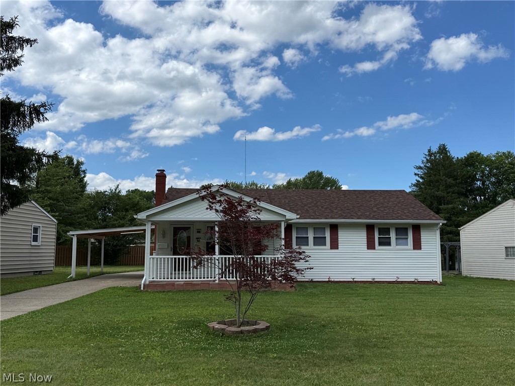 Very clean and exceptionally well-maintained home in a desirable Boardman location! Enjoy relaxing on the inviting front porch and appreciate the curb appeal provided by the concrete driveway and newer carport. This move-in-ready home features 3 bedrooms and 1 full bath on the main floor, along with newer vinyl replacement windows throughout. The updated kitchen comes fully equipped with appliances that stay, including a gas stove, microwave, refrigerator, and disposal. The finished basement offers excellent additional living space with a spacious recreation/family room, a 4th bedroom, a beautiful full bath, and a separate room featuring a Jacuzzi tub for relaxation. Wide basement steps provide easy access to the lower level. Recent improvements include a new roof installed in May 2026. Additional highlights include a fenced backyard, pressure rainwater collection system behind the garage, two garage doors with openers, and a workshop addition at the rear of the garage—perfect for hobbies, storage, or projects. A well-cared-for property offering comfort, functionality, and plenty of extra space both inside and out!