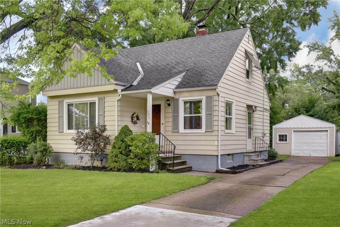 Beautifully updated cape cod is move in ready.  Gorgeous wood floors in many rooms, updated kitchen with gas range, microwave and dishwasher.  Ceiling fans/lights in many rooms, updated full bath.  Basement is framed and ready for finishing.  Lovely wood deck in rear overlooks treed lot.  1 car detached garage.  This one won't last, make this home today.  Basement waterproofed w/transferable warranty.