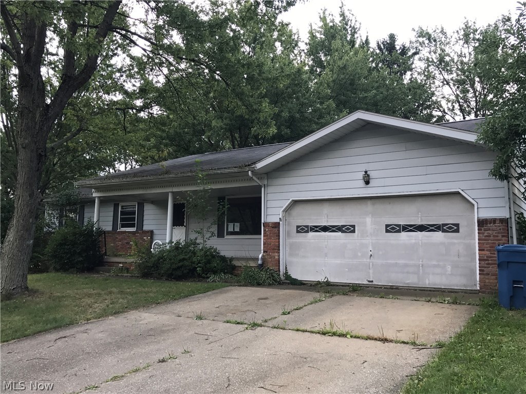 This home features a large corner lot with fenced in back yard, 2 car attached garage and a nice front porch to enjoy those summer
evenings. When you walk in the front door there is a living room to the right featuring a large picture window. Continue on into the home
to the Dining room. The nice size bedrooms and bathrooms are to the left and the Kitchen and family room are to the right. The Family
room features a fireplace for the cold winter evenings. From the family room there is a sliding glass door to access the spacious back
yard. The basement has 2 finished rooms and lots of area for storage or finish the entire lower level for more living space.  Shed also in back yard.  This home needs some TLC.
