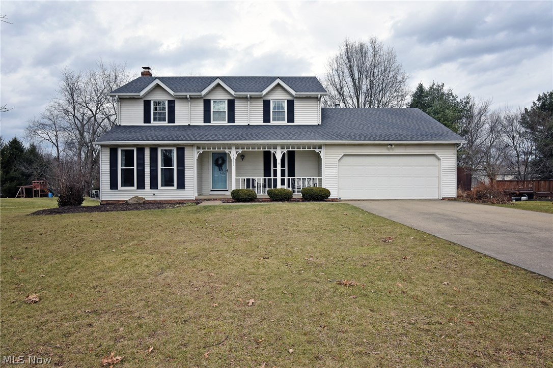 Welcome Home!! Beautifully updated and immaculate, 4-bedroom, 2.5 bath Colonial in quiet West Moore Allotment in desirable Jackson Township! This delightful 2,000+ square foot floor plan offers a large great room with fireplace, open & fully applianced kitchen with large bay window,and Corian counter-tops. You will love the Kraftmaid cabinetry with soft close drawers, ample counter space and open concept feel, perfect for entertaining! Formal dining room and spacious great room with beautiful brick fireplace and separate formal living room. First floor bedroom could double as office or den. The spacious second floor is full of light and has three bedrooms including a stunning master with luxury bath and garden tub. Enjoy cozy evenings and entertaining on the back deck. Many updates including: New appliances 2016, new first floor carpet 2017, partially finished basement complete 2015. Come see this stunning colonial home and be impressed!