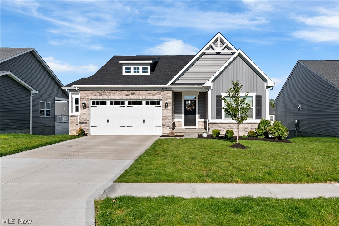 Nestled in a prime Canton location, 6877 Harrington Ct offers a rare opportunity to own a meticulously maintained, one-owner home that perfectly balances modern luxury with everyday functionality. The heart of the home features a stunning kitchen outfitted with elegant granite countertops and high-end stainless steel appliances, creating an inviting space for both daily meals and sophisticated entertaining. Designed with convenience in mind, the floor plan includes a highly desirable main-level laundry room, ensuring a seamless living experience. Adding to the home's versatility is a spacious walkout basement, which provides easy access to the outdoors and serves as a blank canvas for additional living space, a home gym, or a recreation area.

Beyond the walls of the home, the lifestyle offered by this property is truly exceptional. Residents enjoy a wealth of amenities included with the annual association fee, providing exclusive access to a community pool, a well-equipped exercise facility, a recreation room, and a playground. The location is a nature lover's dream, situated near the beautiful trails and scenic vistas of Stark Parks, while still maintaining close proximity to local shopping and dining. This home represents a perfect blend of community, comfort, and quality in one of the area’s most sought-after neighborhoods.   Call today to set up a private showing!