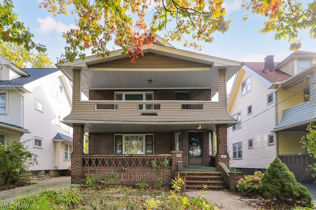 Fully occupied, 3 unit home in the fantastic Larchmere neighborhood! This property is perfect to add to your investment portfolio or if you would like to wait out a lease and owner occupy one of the units. Brick, Central AC on the first 2 floors, this property still captures much of it's original charm; Harwood floors, leaded glass windows, original wood moldings and doors and original built-ins. All 3 units have nice size and common layouts while the basement is large and clean. Dual front porches and back decks give you the opportunity for some out door living. A four car garage rounds this great property out.