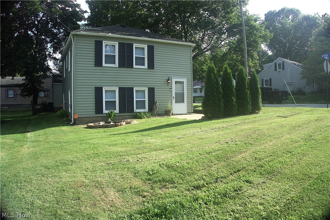 Welcome to this move-in-ready 3-bedroom colonial in Barberton's Boulevard Heights. Thoughtfully updated and waiting for its next owner, this home blends classic two-story character with the everyday comfort of central air already in place, a genuine rarity in this price range. A bright, open main level flows for easy living and entertaining, while three comfortable bedrooms upstairs offer room to spread out. Out back, a detached 2-car garage adds parking and storage. Set on a quiet street in the Barberton City School District, you're just minutes from Lake Anna, neighborhood parks, shopping, dining, and quick highway access toward Akron. Whether it's your first home or your next investment, this one delivers comfort, updates, and location in one affordable package. Schedule your private showing today.