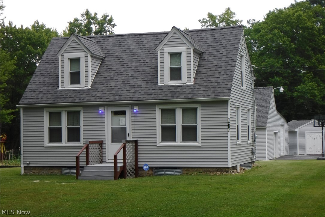 2 acres with a great family home Free Gas. Basic home with something for all. Dead end street, mechanically upgraded, lots of space - garages, outbuildings with many perks. All vinyl sided - 12x20 - 3 seasons screened porch - tilt windows - Howland Schools - ONE OF A KIND.