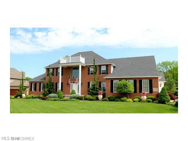 Absolutely Stunning 5 Bedroom Brick Colonial with 3 Car Garage! Home Features Include: 1st Floor - Unbelievable Kitchen with Huge Center Island, Stainless Steel Appliances, & Breakfast Area, Large Great Room with Fireplace, Front Formal Dining Room, Front Formal Living Room, & Sun Room with View of the Lake. 2nd Floor - Spacious Master Bedroom with Sitting Area, Large Master Bath, & Huge Master Closet - plus 3 other Large Bedrooms. Lower Level Offers a Huge Rec. Room with Sitting Area, Bar Area, & Office Area. Home offers a Back Deck & Lower Back Patio leading to a Private Back Yard with View of Lake. Home is very well maintained with Tons of Upgrades. Home also offers Sprinkler System for Lawn.