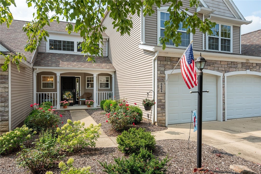 Wonderful maintenance free living in this North Point at Hunters Crossing condo with over 2,000 square feet of living space and an incredible pond view. Owners chose the Bainbridge model which boasts a first-floor master and extra-large kitchen. As you enter the front door your greeted by lovely hardwood floors that lead you past the half bath and coat closet to the main living area with soaring vaulted, ceilings, cozy fireplace, and dedicated dining area. The fully equipped extra-large kitchen is a chefs dream with lots of cabinet space, newer appliances, and plenty of room for all your entertaining! Off of the dining area is the private spacious master suite with walk in closet, lots of extra storage, and the master bath has double sinks, separate soaking tub and walk in shower. Continuing the main level there is convenient first floor laundry and a roomy, deep attached 2 car garage. The house mechanicals are accessed from the garage with newer hot water heater and regularly maintain