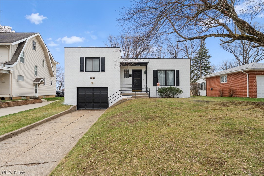 This is your opportunity to take a mid century modern home and make it come alive with new style. Ready for it's new family with neutral finishes.
The home has updated kitchen cabinets and eat in bar area.   Generous bedroom sizes and a flexible layout provide the space you need, whether for everyday living, work or guests.
The added living space and storage areas provided in lower level make this a great family home.
Tandem garage allows for extra storage or two car parking.

Solid brick construction, tasteful updates, and an established neighborhood make this home a standout opportunity that won’t last long. Located close to shopping, dining, schools, and everyday conveniences, it offers both comfort and convenience in one package.

Homes like this—updated, well-maintained, and in sought-after neighborhoods—are in high demand. Schedule your showing today before this one is gone."