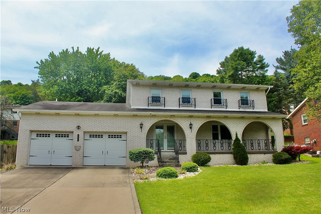Welcome to 339 Country Club Blvd! This spacious 4-bedroom, 3 full bath, and 1 half bath brick home offers room for everyone. Featuring two large living areas, a formal dining room, a sunroom, and a fully finished basement, this home provides endless possibilities for entertaining and everyday living. The primary suite includes its own private bathroom, while abundant storage can be found throughout the home. Outside, enjoy a fenced backyard, attached two-car garage, and a highly desirable location close to shopping, dining, schools, and recreation. Conveniently located just 40 minutes from Pittsburgh, this home is full of potential and ready for your personal touch with some cosmetic updates.