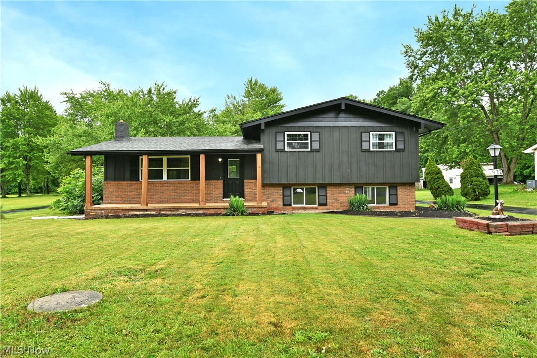 A visual stunner from the inside out, this enthralling Cortland home will have all of your Pinterest dreams coming true and then some! Instantly attracting with its high contrast exterior paring with warm brick and its cedar trimmed, covered front porch, the residence will leave you waiting for more. Around the back, a huge, three-car garage includes modern lighting, striking tin work and a matching corner bar area, prime for entertaining. Meanwhile, both a sunken rear patio and raised deck area overlook the backyard. Step inside to find an open first floor layout with its daring fireplace and hardwood style flooring underfoot. Recessed lighting shines down over the corner dining are as French doors open to the deck. Nearby, the impressive central island includes a lovely wood countertop and a built-in wine cooler. The style continues into the adjacent cabinetry and counters, all divided by splashes of brightwork in the stainless appliances and custom basin sink. Upstairs, an immersive full bath wows with its broody colors and uniquely tiled vanity with gold accents. The trio of inviting bedrooms each provide bright and engaging surroundings as they increase in size to the master, complete with a private half bath. Down below, a handsomely tiled flex space leads to both a play or rec room along with the lower basement storage. Call today for your own personal tour!