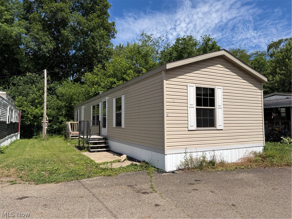 *RENT TO OWN AVAILABLE* Check out this modern one-story mobile home in Massillon! Built in 2021, the open floor plan includes a large living room, a spacious eat-in kitchen that’s fully applianced with tons of cabinet space, and a sizable master suite with private bathroom. There are 2 additional bedrooms and a 2nd full bathroom. Laundry hookups are located in the hall for added convenience. Enjoy affordable, low-maintenance living in this quiet neighborhood, located just minutes from Downtown Massillon. Call today to schedule your private showing!