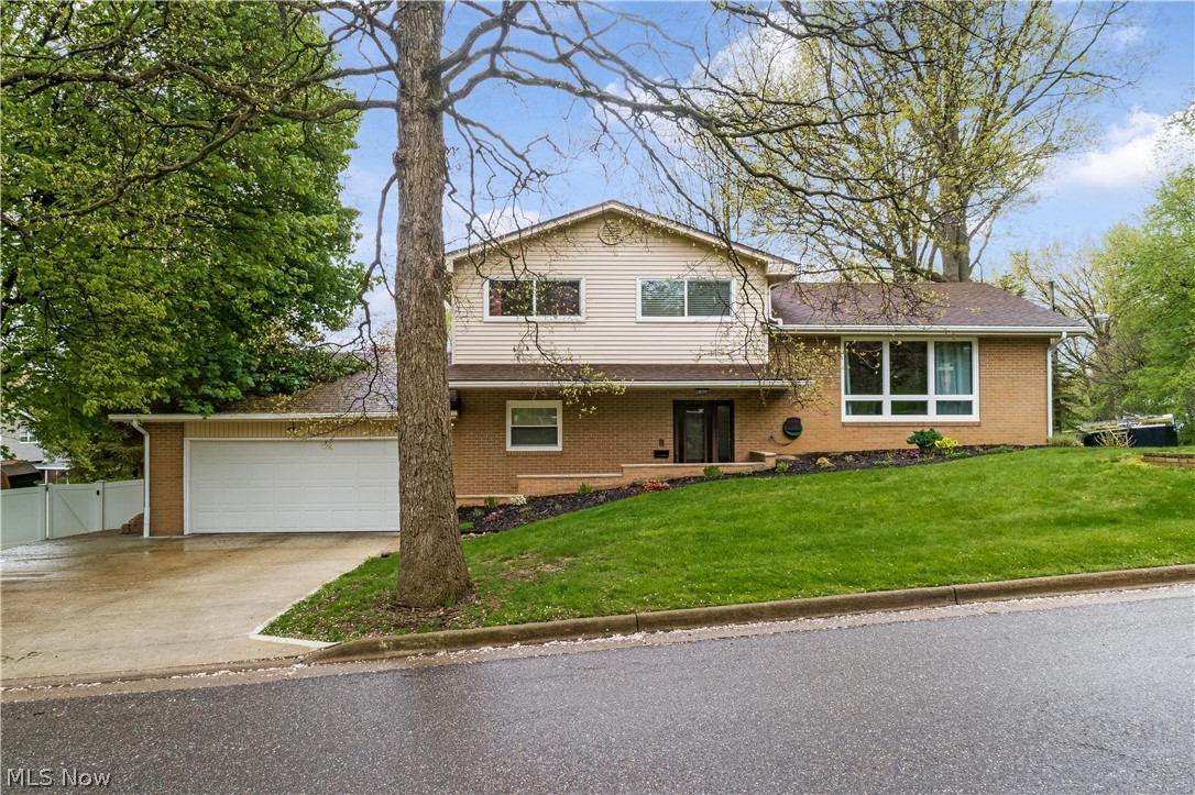 Beautiful move-in ready split level in North Canton CSD! 4 bedrooms, 2 full baths, along with so many updates! The large eat-in kitchen offers custom cabinetry, granite countertops, and ceramic tile floors with stainless steel appliances. Beautifully finished hardwood floors throughout the living room and bedrooms. 3 bedrooms are on the second floor and one on the lower that could make for a great office space. The spacious master bedroom has a double closet with a walk-in! 2 full bathrooms have been beautifully updated in 2019 with tile shower surrounds, and one includes a double vanity and granite counters. Cozy up in the family room by the fireplace or enjoy a nice day on the enclosed patio! It's a quiet corner lot, plus it's close to Belden Village! This home is ready for new owners to enjoy! So much peace of mind with updates that include: New Roof and Furnace (2016), Windows (2017), H20 Tank, A/C Unit, Vinyl Fence and Paved Driveway (2019) Schedule your showing today!