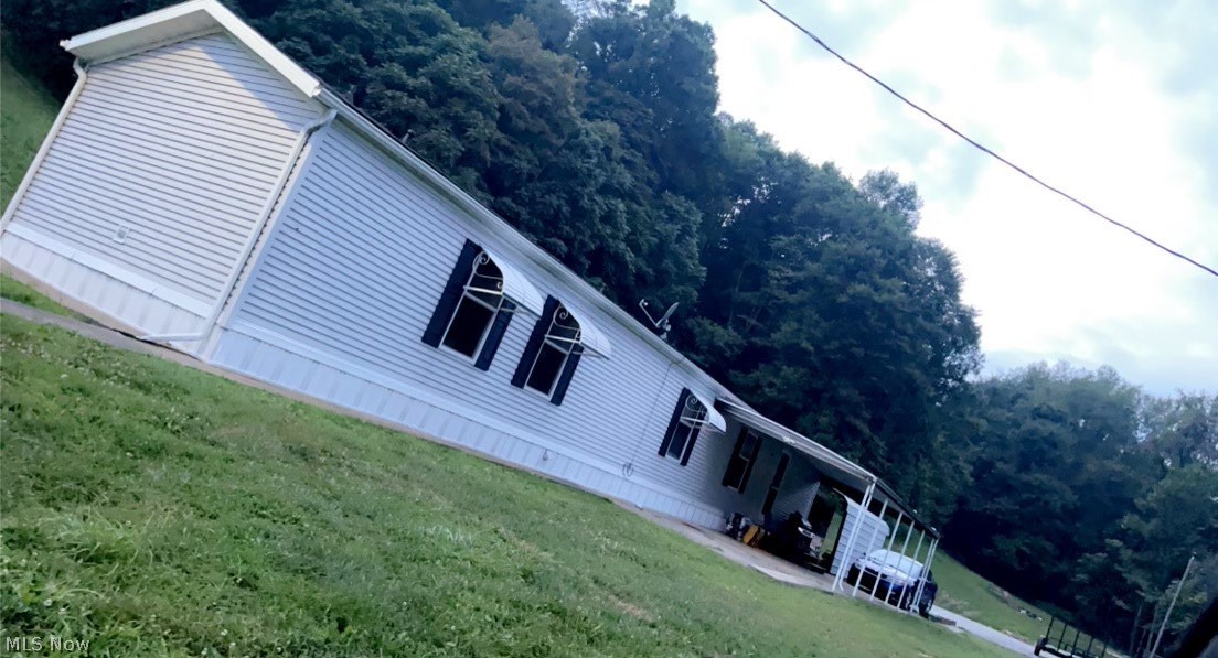 Come and see the beautiful views this property has! With around 10 acres wooded and 14 acres of beautiful hillside. This property has a recently updated mobile home, along with a covered porch, and a 24x40 Garage/shop. Not only is this a great property for wildlife it also has fantastic views from the top of the hill. This move in ready home is in the country but only a few minutes from town! Don't wait schedule your showing today!