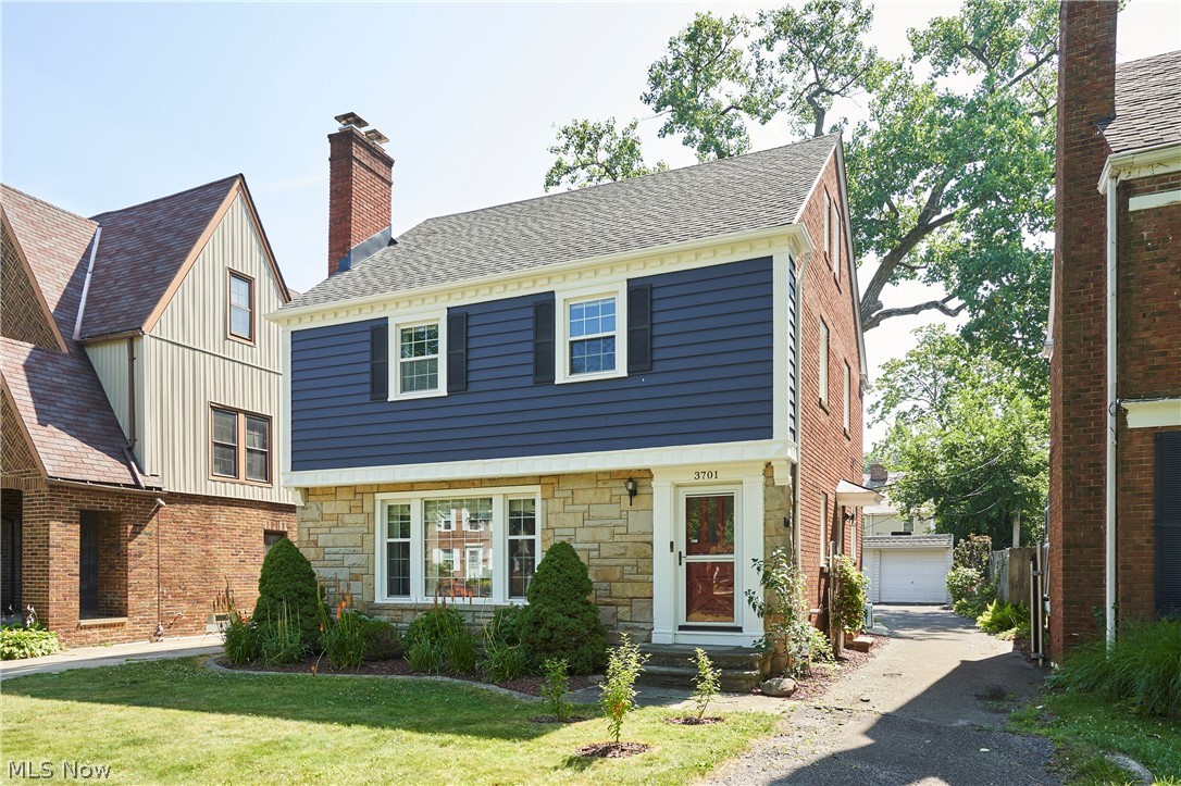 Welcome to 3701 Glencairn Road, a charming Shaker Heights Colonial filled with warmth, character, and thoughtful details throughout. Beautiful hardwood floors flow through this first level, creating a rich yet comfortable feel. The spacious living room is
filled with natural light and features a gas fireplace and built-in shelving, then opens to the sizable dining room with additional built-ins and a door to the outside covered patio. The bright kitchen offers custom cabinetry, a large pantry, granite countertops, ceramic flooring and the added bonus of motion-sensor lighting. A half bath completes the first level. Upstairs, the rich hardwood floors continue through the bedrooms and hallways. The primary bedroom thoughtfully includes two closets and a mounted TV, while two additional bedrooms provide comfortable space, including one with access to a private balcony. The second level also offers both a full bath and a separate half bath for added convenience. Ascend to the third floor and find flexibility, with another full bath, a bonus room ready to suit your needs, and storage space. Continue to the basement, featuring a large, carpeted recreation room with a gas fireplace and mounted TV—perfect for relaxing, gathering, or entertaining. Outside, enjoy a well-landscaped backyard with a covered porch, patio and privacy fence, offering a lovely space to unwind or host guests. Close to everything Shaker Heights has to offer, this beautiful home combines charm with comfort for everyday living. Don’t wait, call for your personal tour today!