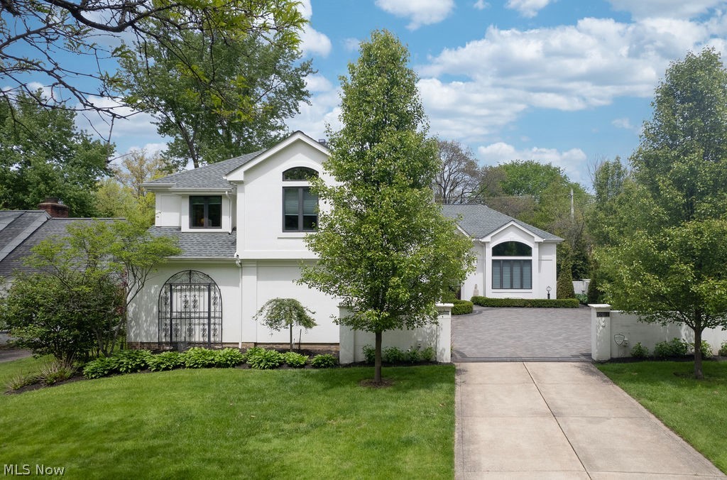 This remarkable Shaker beauty was built in 1993 and has had 2 owners: the original owner who custom-built it and the present owner who purchased it in 2016.  The present owner added numerous updates.  Some MAJOR improvements include an 8-year-old roof, an enclosed sun porch with Stanek windows to create a more versatile 3 season entertainment space (a gas line is present if buyers choose to heat the room), replaced windows, HVAC approximately 5 years old (2 furnaces), a new kitchen and appliances in 2019,  new courtyard and brickwork around that same time. The list is endless.  This home is architecturally stunning.  From the front door you'll see the oval dining room, the great room/living room with built-ins and a beautiful fireplace wall, oversized windows and the open white kitchen.  The walls are ideal for art collectors. Several rooms lead to the back sunroom.  There is a handsome Amish made den with built-ins galore  just before the owner's first-floor suite.  The suite has a glamour bath and two walk-in closets.  The 2nd floor has two en-suite rooms.  There is also a full bath in the lower level.  If you're a gardener, this is your paradise.  If you entertain and love to cook, this is your dream kitchen that leads to a huge sun porch offering versatile entertaining space.  
Don't miss this gem.