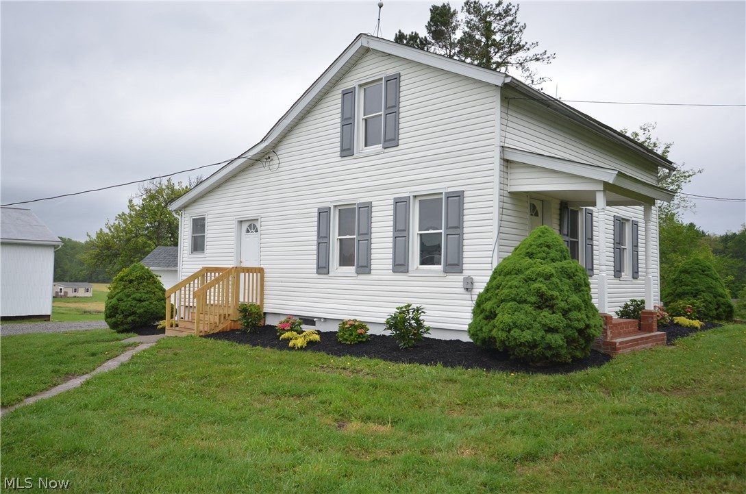 Updated farm house on 5 acres. Rear 3 acres being farmed by local farmer pays $210/year, planted in soybeans to be harvested in October. Free gas from gas well located on adjoining property. Mineral rights previouly reserved and do not transfer. 40' x 80' pole barn with electric. This is an estate sale being sold "as is".