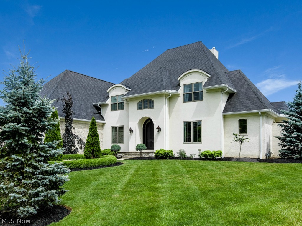 Exceptional custom built home in the prestigious Glencarin Forest.  A grand entrance with a curved staircase opens into the spectacular 2-story lofted great room and impressive dinning room.  The kitchen, overlooking the gorgeous hearth room, is truly remarkable in quality and attention to detail including stainless tile backsplash, gorgeous granite and an extended island prep area.  One of a kind first-floor master bedroom boasts 2 walk-in closets, a gas fireplace, and a remarkable master bathroom with a stunning soaking jet tub, glamorous tile shower, heated travertine floors, marble counters and custom cabinets.  Separate guest living suite on the second floor offers an en suite bathroom and full walk in closet.  Three more bedrooms complete the second floor with the lofted view over the great room to the private backyard.  Entertain on the back patio area with the wood burning fireplace and professionally designed landscaping.  This incredible home offers the highest quality crafts