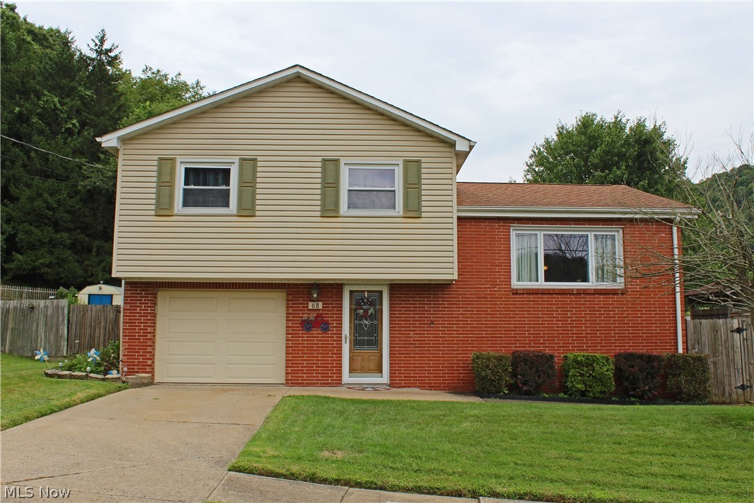 Say yes to a new address! This nice 3BR multi-level home is waiting for you. Lovely entry with hardwood floors extending into the spacious living room and new kitchen with granite countertops and stainless appliances. Lots of updates including gas furnace, entry doors, and roof. Don't be the last to see this home! Home Warranty included.