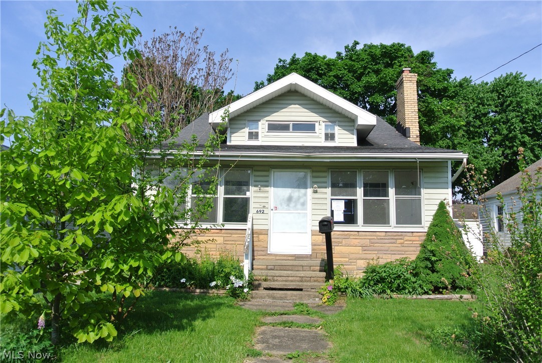 Welcome home to 692 Seiberling St in Akron. This nice sized 5 bedroom bungalow style home is just waiting for your personal touches. This home features a large kitchen with lots of cabinet and counter space. Nice sized living room with fireplace. Dining area is open between kitchen to living room area. Master Bedroom with carpet, 2 closets, plus private full bath located on upper floor. Total of 2 bedrooms on the first floor, 3 bedrooms on the upper level. Huge basement with partially finished recreation room towards the back. Detached oversized 2 car garage with storage area. Enclosed front porch entry. Spacious wood deck off the back. HUD #412-725081. Property is being sold "As-Is". It is FHA IE - Insured Escrow. (Insurability Subject To Buyer's Appraisal). Pre-Approval or Proof of Funds are required. Buyer is responsible for all due diligence and inquiry of all property information and condition. Owner occupancy restrictions may apply. *Equal Housing Opportunity* Please visit HUDHom