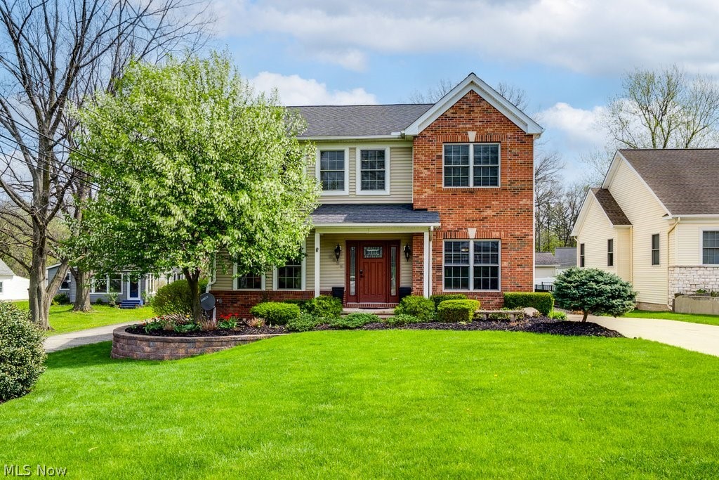 Welcome to this beautifully updated 4-bedroom, 4-bathroom colonial, just a short walk to beautiful downtown Independence! Boasting over 4,000 sq. ft. of FINISHED living space, with an open concept floor plan and functional design! Hardwood floors thru-out the first floor, PROFESSIONALLY REFINISHED JUNE 2026 as well as a beautifully UPDATED kitchen and powder room!  The main living areas provide an easy flow for everyday living and entertaining, and the home features dual-zone heating and cooling along with a tankless hot water system for added efficiency and comfort. The expansive owners' suite offers vaulted ceilings, a walk-in closet, and en suite bath with spa-like steam shower that adds a relaxing, luxury feature to the home. 3 additional bedrooms plus a laundry room AND loft complete the second floor. The finished lower level adds valuable additional living space with a built-in bar, ideal for entertaining or hosting gatherings, recreation room and gaming area PLUS a bonus room and additional FULL bath! Outside, enjoy a custom entertaining area, complete with a built-in fire pit, PATIO RE-SEALED JUNE 2026, and pond- along with an irrigation system for easy lawn maintenance. Additional highlights include a 3-car garage, completely fenced in yard, and convenient access to parks, recreation, dining, shopping, and major highways for an easy commute.