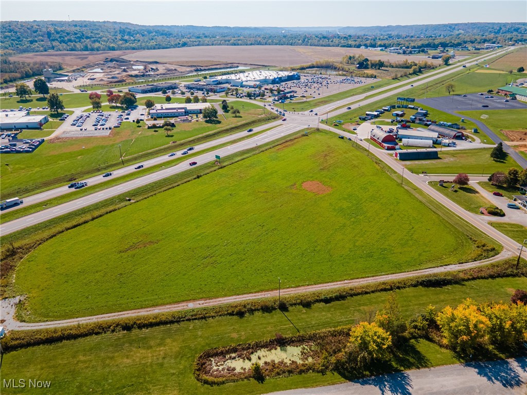Attention to all potential investors and developers, an 18.9-acre parcel of land is strategically positioned at the bustling intersection of U.S 36 and Airport Road in Coshocton County. This prime location is situated opposite Wal Mart and various retail outlets, in proximity to Genesis Medical Center, and in the vicinity of the forthcoming GentleBrook Homestead. This site presents an exceptional opportunity for your business endeavors.