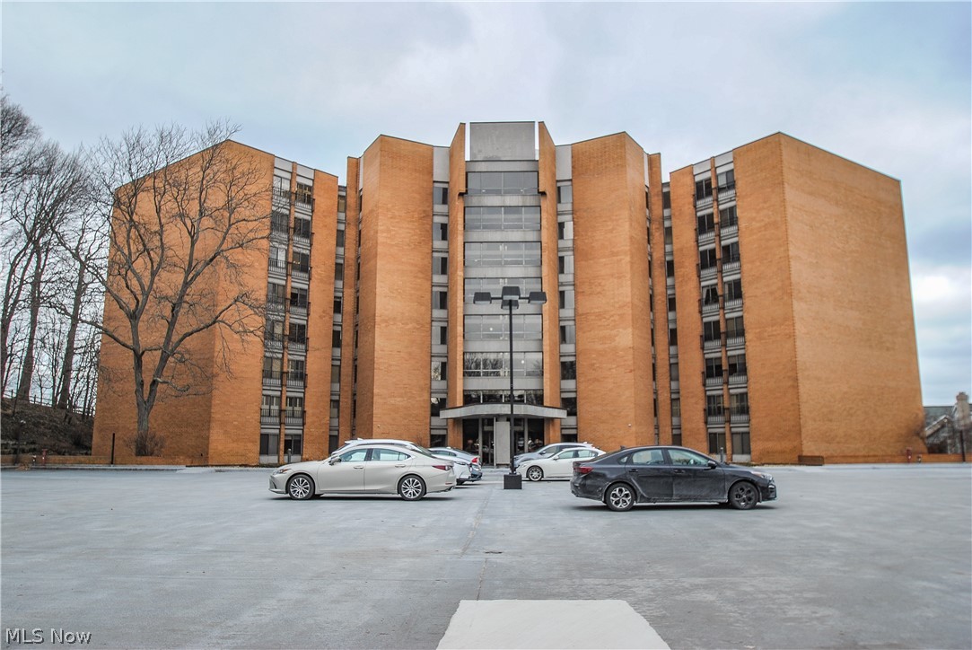 Fabulous 6th Floor Suite With Tree Top View Of Lake Erie With Both Sunset And Eastern City Views …. 40' Of Windows Facing Lake Erie …. Impressive Interior …. Newer White Kitchen With Breakfast Bar And Newer Stainless Appliances …. Newer Bathrooms With Large Showers …. In-Suite Utility With Newer Front Load GE Washer And Dryer …. Two Large Bedrooms Plus Open Office Area Facing Lake Erie …. One Car Garage Space With Extra Garage Parking Available For Yearly Fee …. Maintenance Fee Includes Gas, Heat, Water, Sewer And Much More …. See MLS Picture Illustrating New Hallway Décor And Renovation Presently Under Construction ….