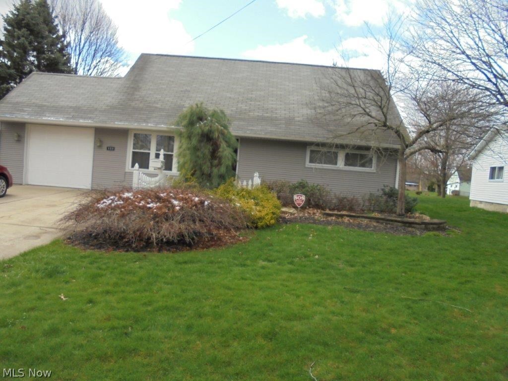 Newer windows and vinyl siding. Three seasons room with access to a beautifully landscaped back yard. All appliance including the washer and dryer remain. Seller is offering a home warranty.