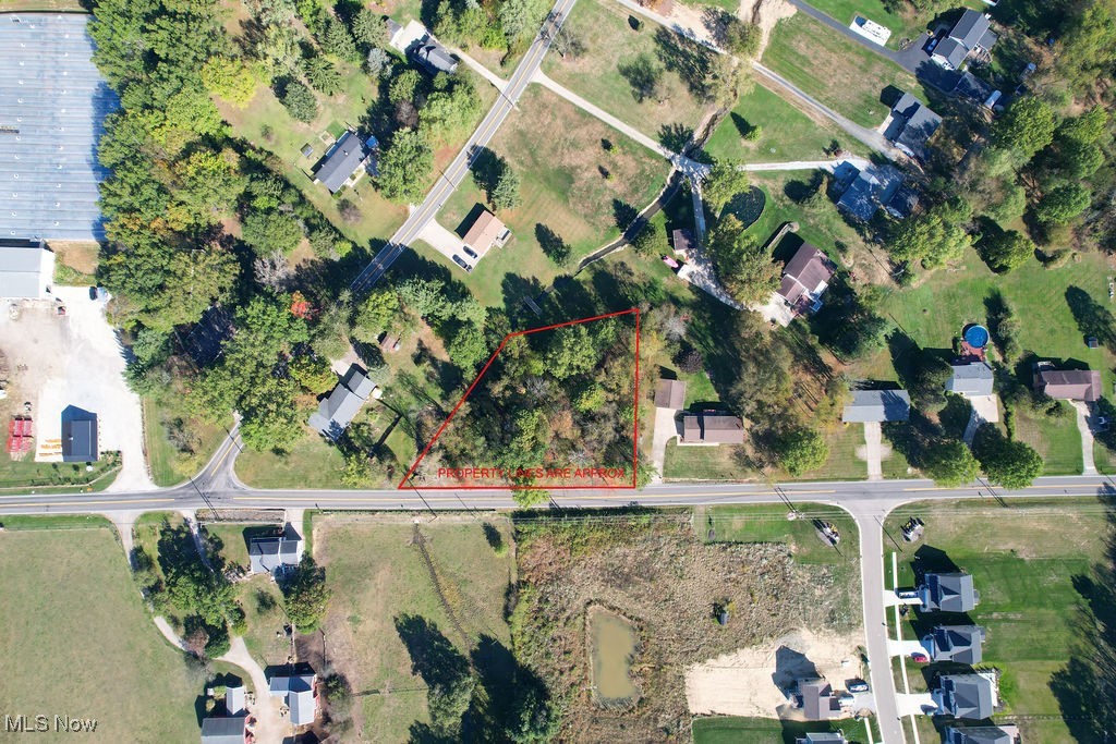Opportunity awaits to have your dream home built on this wooded lot that spans just under an acre in Field Local School District!  This location provides easy access to Akron, Kent and Ravenna.  There is plenty of room for a large yard here for kids and pets to run and play.  Bring your dreams and vision.  This lot is just begging for a beautiful home to be built on it.