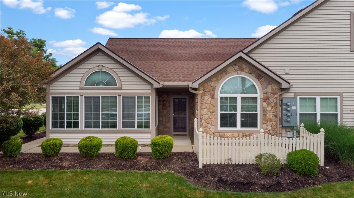 Beautiful Ranch style Condo/Cluster Home with an open floor plan and cathedral ceilings throughout! This unit has a view of the ponds and the clubhouse. The Canterbury floor plan features 1991 square feet of living space; two bedrooms and two full bathrooms; an office (potential third bedroom); a sunroom full of windows; spacious kitchen and dining area, living room with gas fireplace; first floor laundry room, plenty of storage and an attached two car garage (with storage above). LVP flooring throughout the living areas and bathhrooms, and the bedrooms are carpeted.   The roof was repalced by the Association in 2019.  All appliances including washer and dryer are included.  Enjoy an active lifestyle by utilizing the community clubhouse, pool, & fitness center, all while your exterior maintenance, lawn care, landscaping and snow removal are taken care of for you! Crossings at West Valley is located just minutes from shopping, dining and entertainment in Brunswick Hills, Ohio. Call Today to set up a private showing!