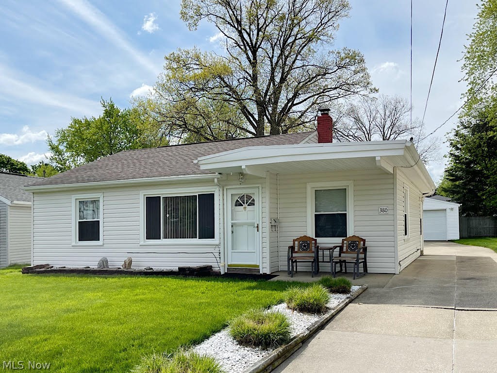 Exceptional opportunity for one floor living in this adorable, 3-bedroom ranch in an area of super nice homes! The outside will impress, with vinyl siding and an architectural shingled roof. The inside is welcoming with fresh paint and neutral colors. The living room is good-sized and the eat-in kitchen has loads of cabinets for storage, all the appliances and room for a nice sized table. You’ll appreciate the convenience of the utility room close by, too. The bedrooms are roomy. One is even being used as a home office. Improvements include vinyl siding, a new roof and blown-in insulation, all in 2007, and you’ll love the updated, Polaris white vinyl windows for energy efficiency. If you’ve been hoping for a nice yard, this is it!  The lawn is lush and green, and you'll be able to sit out back for hours watching the children play or spend quality outdoor time with family and friends. The long driveway leads to a 2 car detached garage with storage galore, and if that’s not enough, there