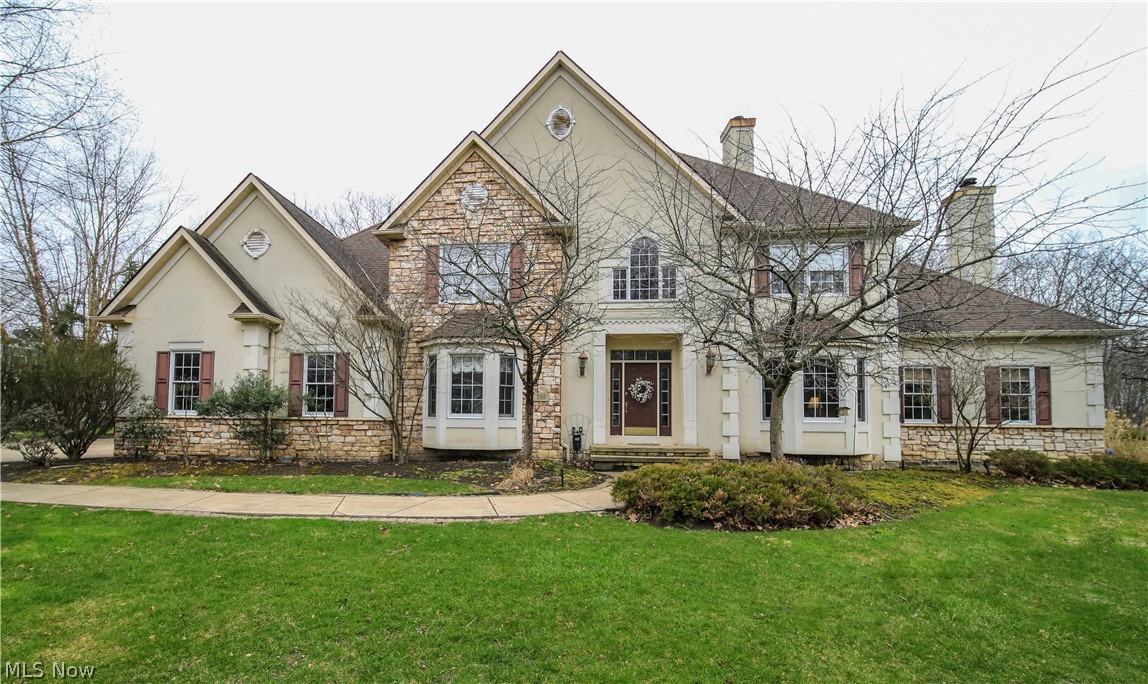 Welcome to this gorgeous contemporary custom built home finished at every level. This one owner home has given many great memories and is ready for new memories to be made with its new owners. This 5 bedroom 4 full bath home is decked out with more than one could ever want in a home. You are greeted by a beautiful 2 story foyer with a private office which includes a see through fireplace to the eat in kitchen. The floor plan opens up to a neutral color palette in the eat in kitchen, stunning dining space, large living room with custom ceilings and another fireplace off of the very private oversized sun room. Main floor living is also an option with a guest suite, laundry and full bath on the main floor. Upstairs you have three additional bedrooms and the master suite with a large sitting room. The lower level does not disappoint with another full bathroom, large custom bar with ice maker and mini fridge plus an additional living space to spread out and don't forget yet another fireplace. If that is not enough, the expansive backyard should be the top of the cake with a deck across the back of the home with a retractable awning, swimming pool, hot tub and fenced in area dividing the balance of continued yard space. Quick access to the freeway and right down the street from the marina. Stop by and view the home that has it all. If you are in the market for your own personal resort this may be the one you have been waiting for. "ask about the 3D Tour"